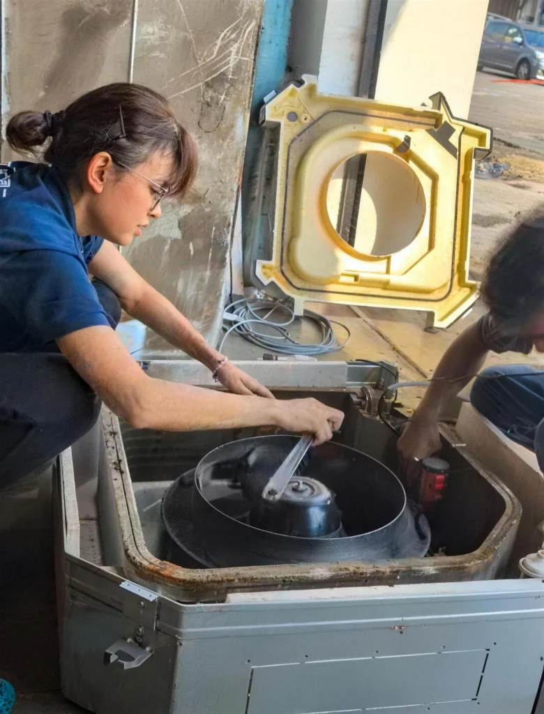 Technician cleaning aircond